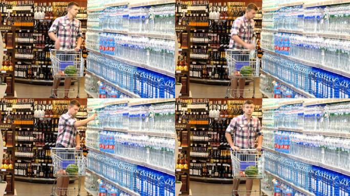 年轻人推着购物车在超市买水