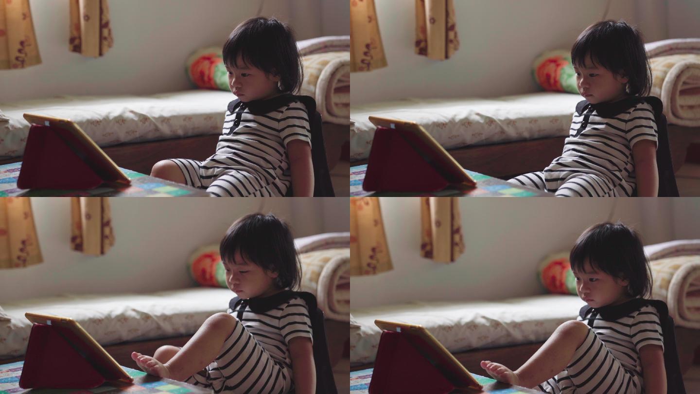 女孩看平板电脑