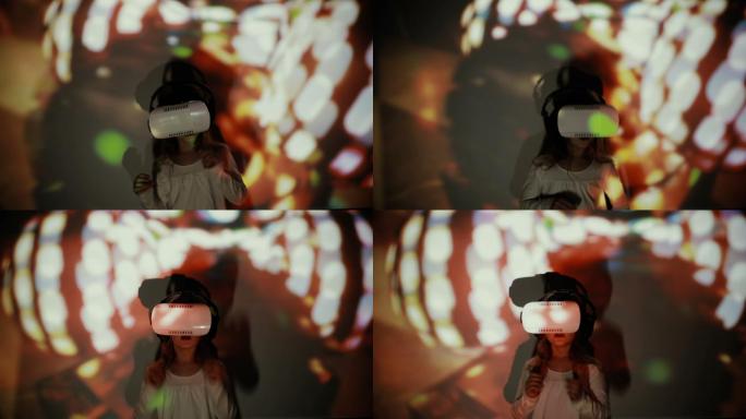 小女孩在智能手机的聚光灯下使用vr头盔