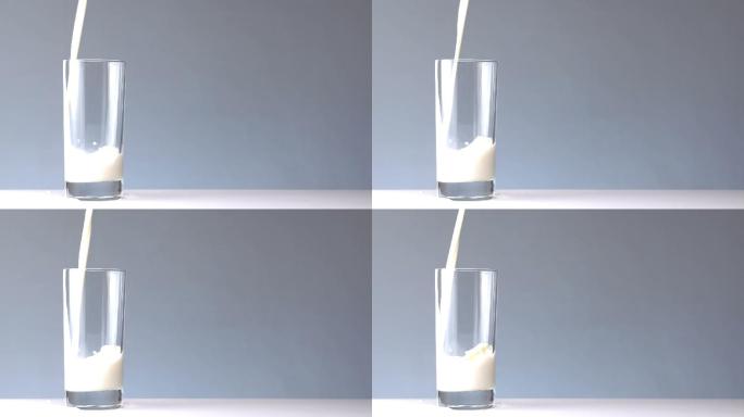 慢动作将牛奶倒入杯中