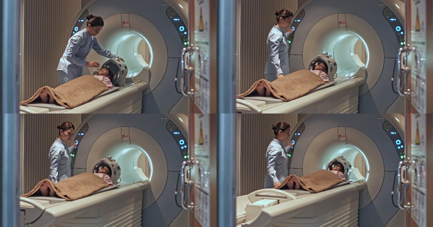 护士在医院为一位年轻的女孩做核磁共振