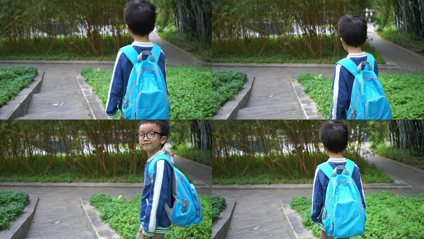 男孩走路去上学独自上学读书学习