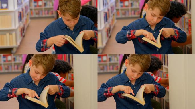 学生阅读一本书在图书馆