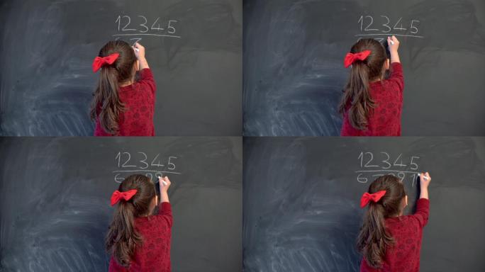 小女孩在黑板上写数字