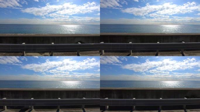 海边开车行驶在海边碧海蓝天海之蓝