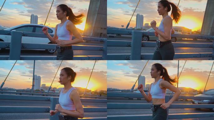 日落，年轻女子慢跑过桥的慢镜头