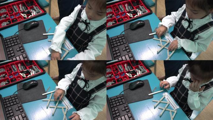 孩子学习组装机器人