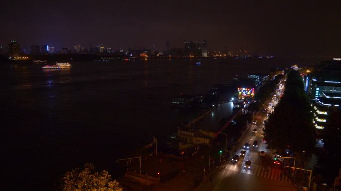 夜间时间照亮武汉城市交通街道屋顶
