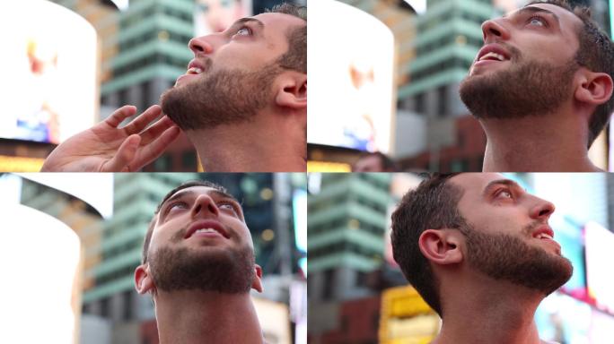 观看时代广场灯光的男游客