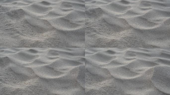沙子在沙滩上从左到右平移镜头。