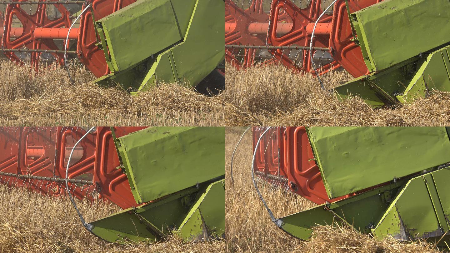 农用联合收割机在夏季收割废弃的小麦。