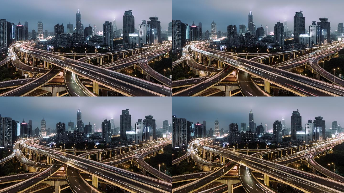 天桥和城市交通夜间鸟瞰图/上海，中国