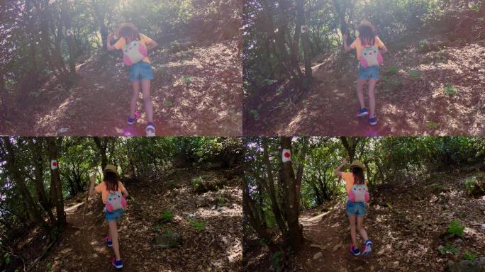 女孩在森林里徒步旅行