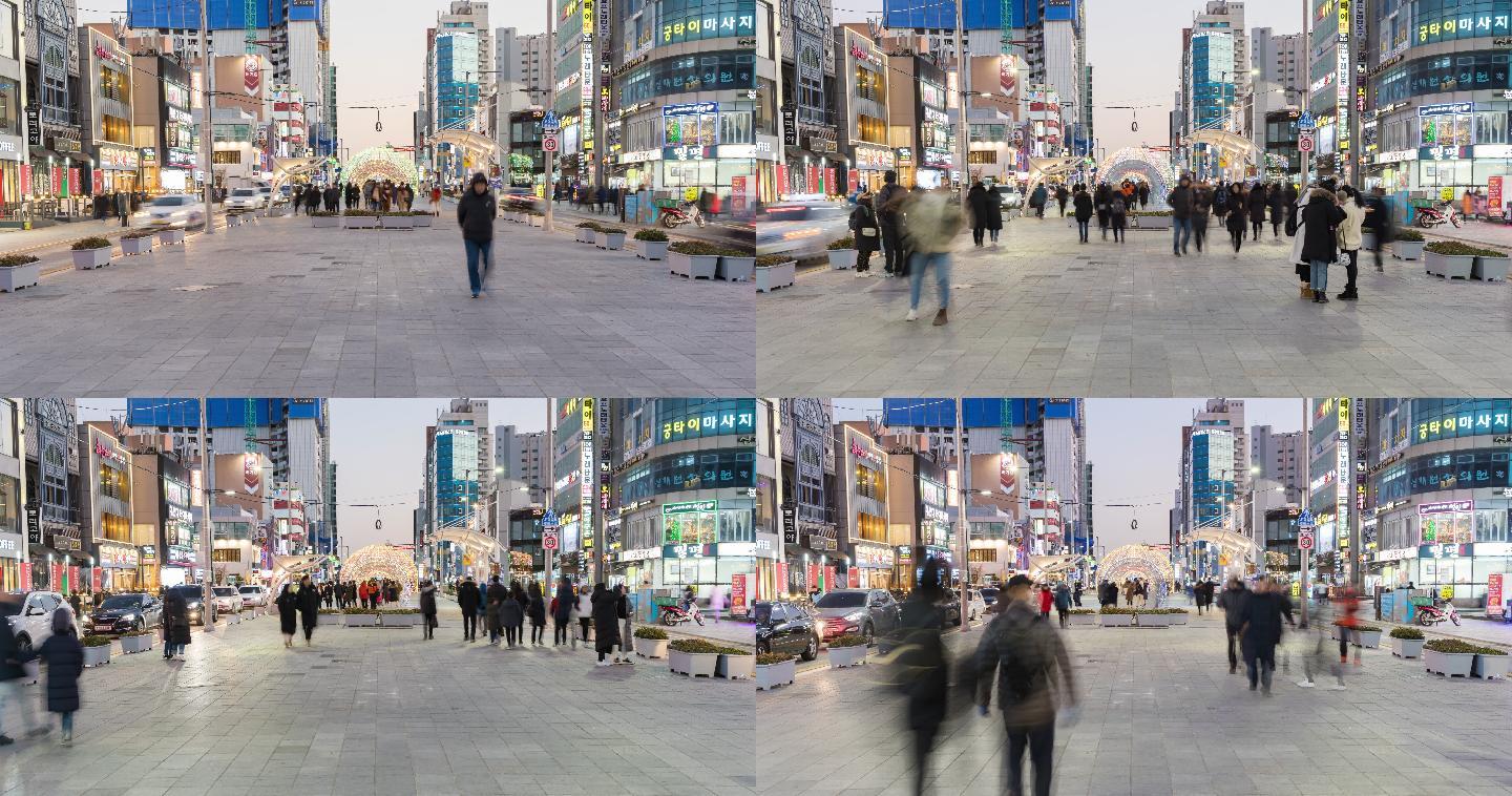 人群走在韩国城市的人行道上
