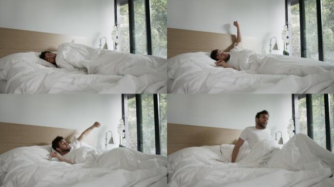 男人醒来伸伸手臂准备开始新的一天