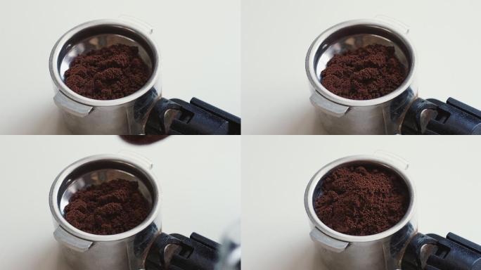 特写夯实的新鲜磨碎的咖啡
