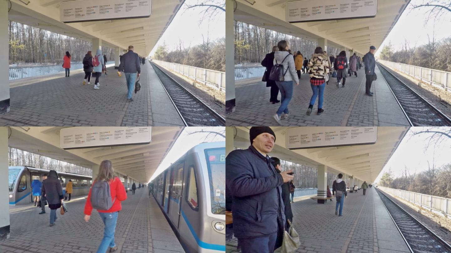 莫斯科地铁站露天站台人来人往上下车乘车
