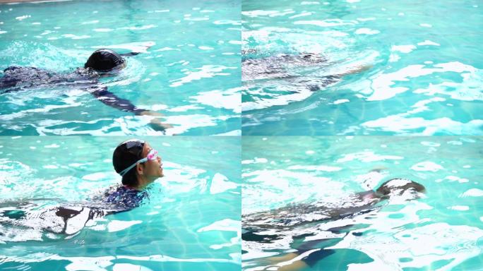 在练习游泳的女孩学游泳