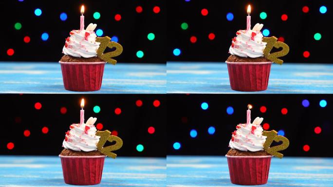 生日蛋糕与燃烧的蜡烛和数字12
