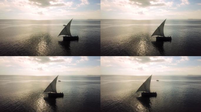 4k无人机拍摄的日落时分海上帆船的画面