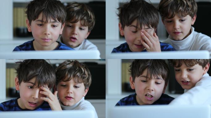 孩子在揉眼睛的同时盯着电脑屏幕。