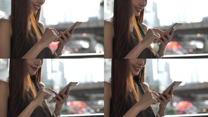 女性使用电话滑动屏幕网上购物聊天