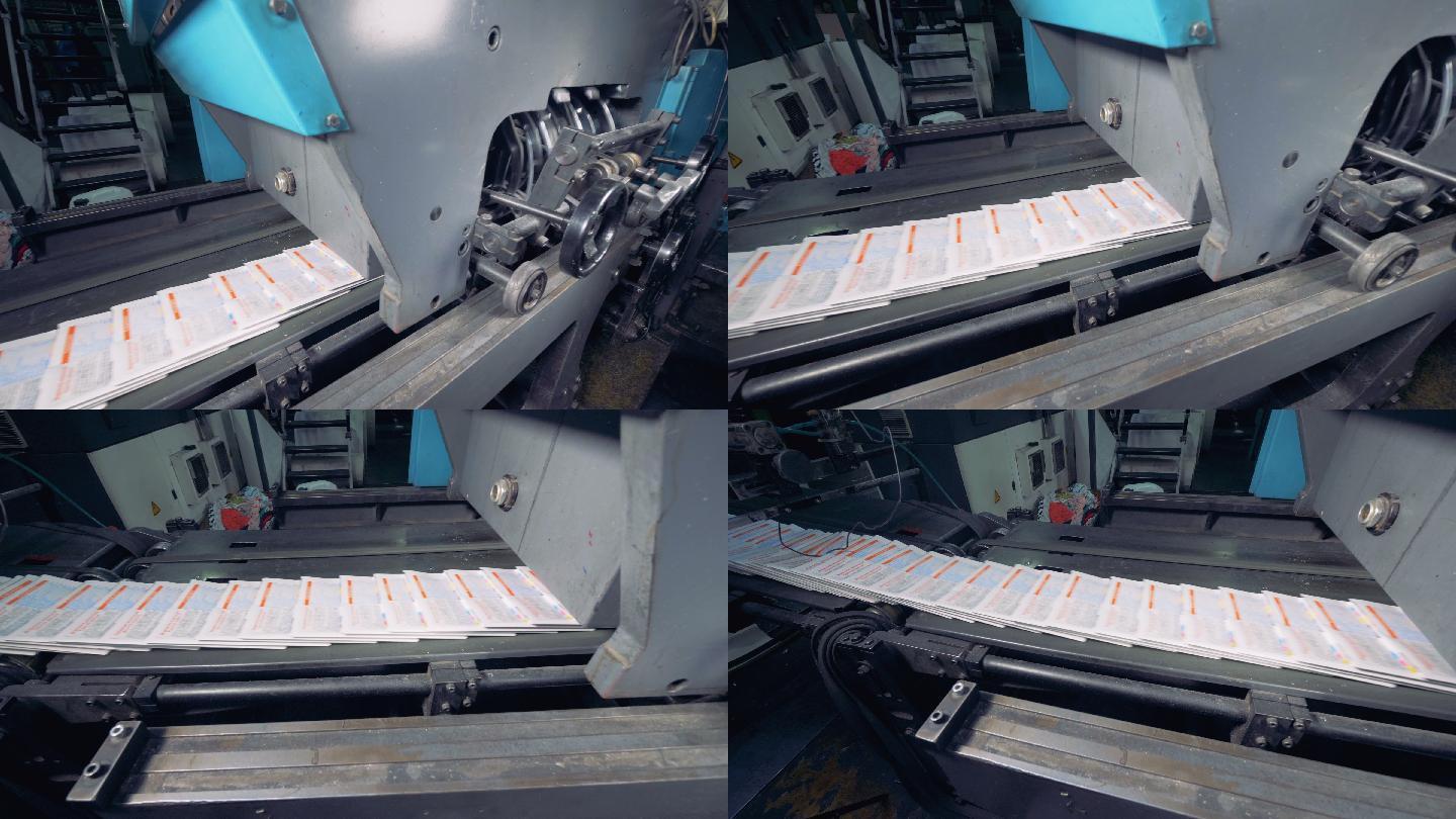 报纸在印刷厂的传送带上移动。4 k。