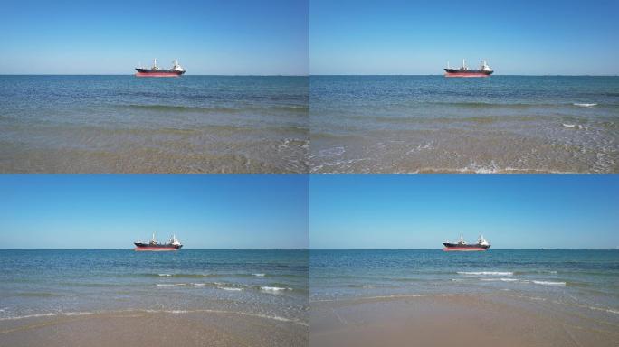 碧海蓝天沙滩附近的航海油轮可持续发展道路