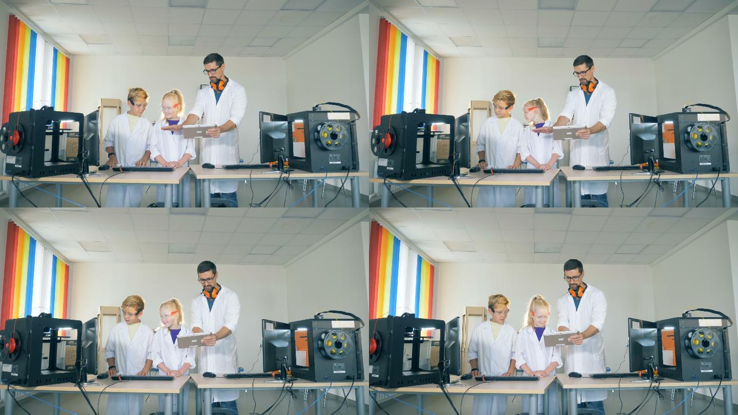 一个男同事在实验室的游戏室里向孩子们演示一个实验。4 k