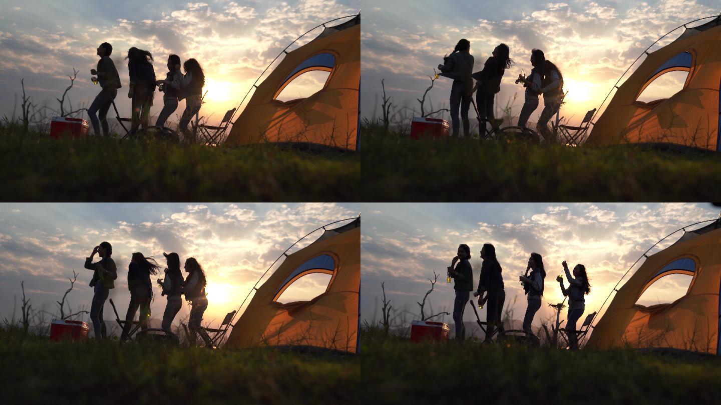 一群年轻的露营者女性闺蜜女孩剪影同学聚会