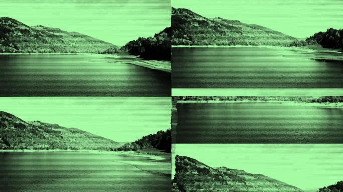 无人机飞过山湖时的像素化静态画面