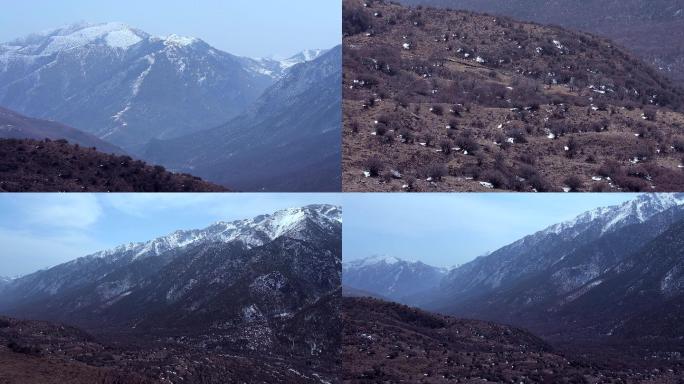 意境雪山绿地交接画面