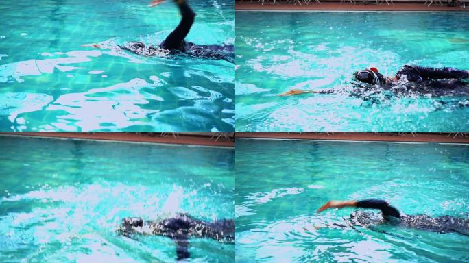 女孩在游泳馆学习自由泳