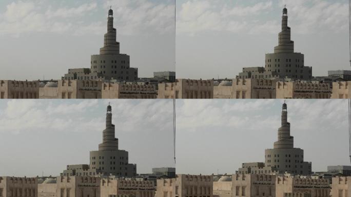在卡塔尔多哈中心的清真寺和尖塔前