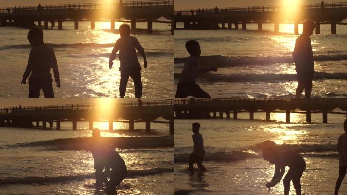 一群小孩傍晚在海滩玩耍