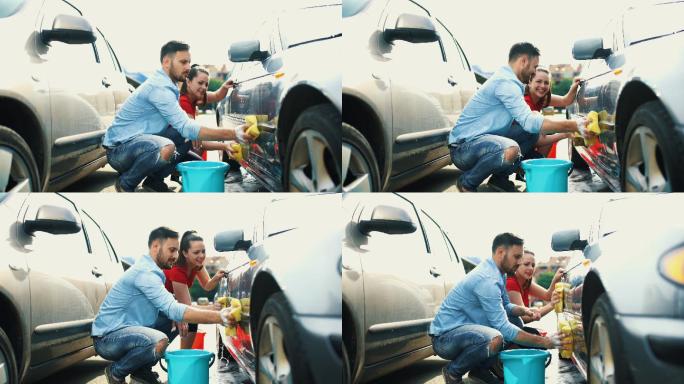 一个30岁的夫妇洗他们的车