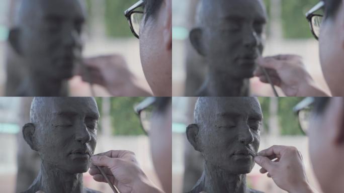 雕塑家创作泥塑的视频片段