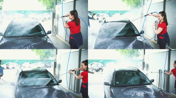 一对妇洗他们的车的特写侧视图。