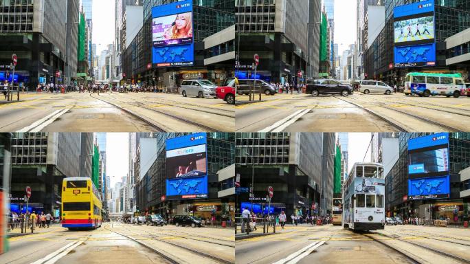 香港市区有轨电车人行横道上的人群。