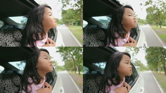 小女孩从车里向外看的慢动作镜头