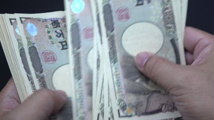 数日元点钞数钱特写镜头大额钞票