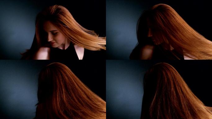 迷人的红发女人甩她健康的长发