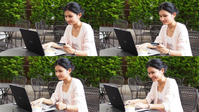 女人用笔记本电脑在网上购物