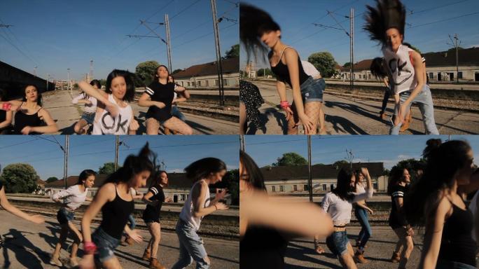 一群年轻女子在火车站跳街舞
