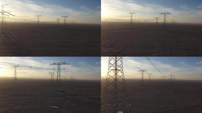 夕阳中荒野电网铁塔