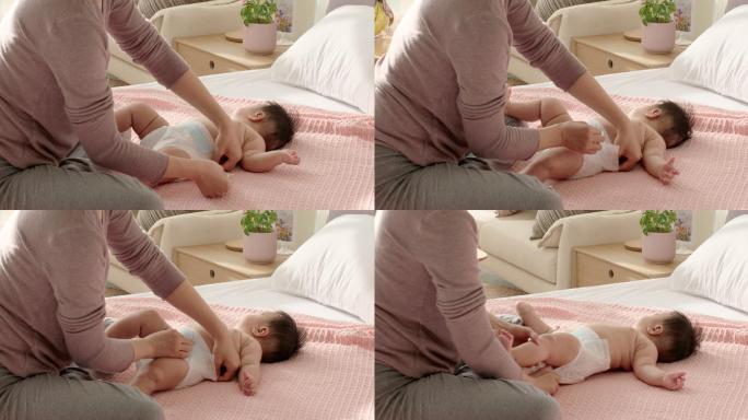 母亲照顾婴儿纸尿布纸尿裤照顾婴幼儿