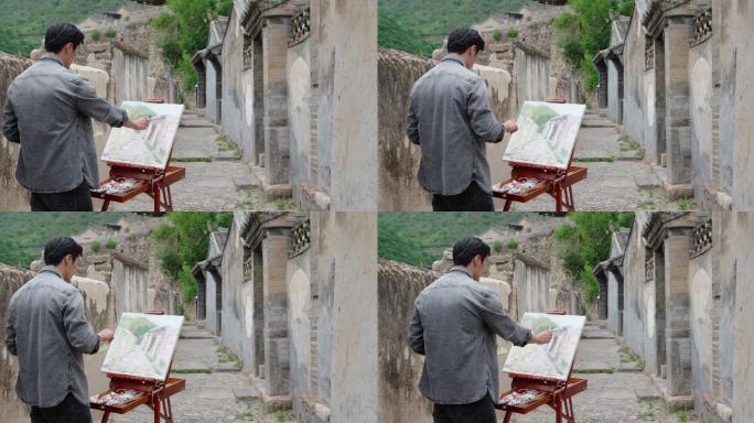 年轻男士在户外绘画