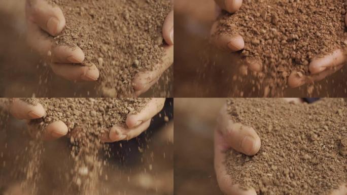 托起希望泥土手中滑落抚摸泥土土壤分析种植