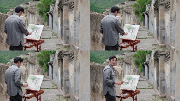 年轻男士在户外绘画