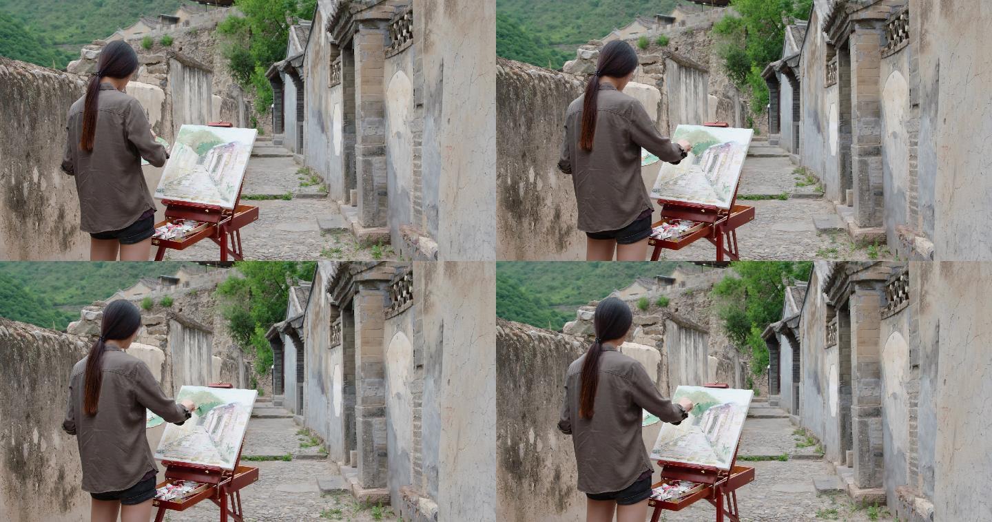 年轻女士在户外绘画
